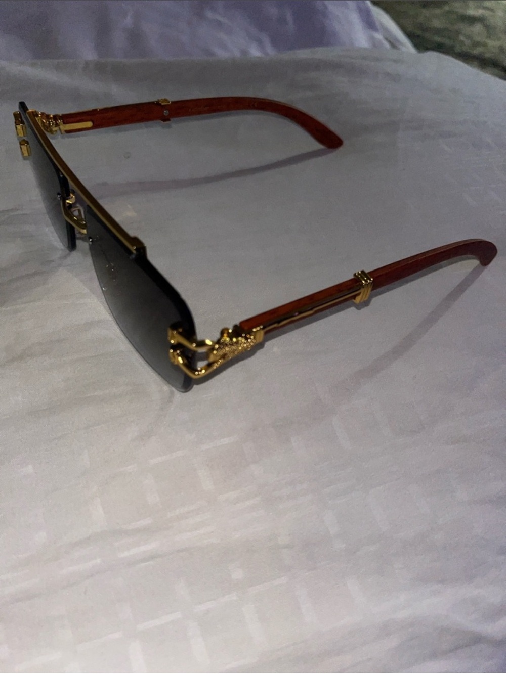 Men's Rimless Sunglasses with Gold Accents and Brown Temples